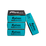 Stack of Rad Wax Cold eco surfboard wax bars and boxes on a white background