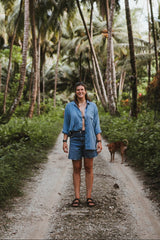 Emily Currie in tropical surf Rad Wax