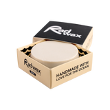 Rad wax base coat bar in a cardboard packaging with 'Rad wax' branding on a white background