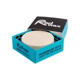 Rad Wax surf wax block in a blue box on a white background