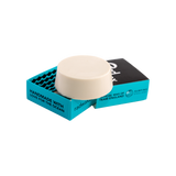 Rad Wax eco surf wax bar with packaging on a white background