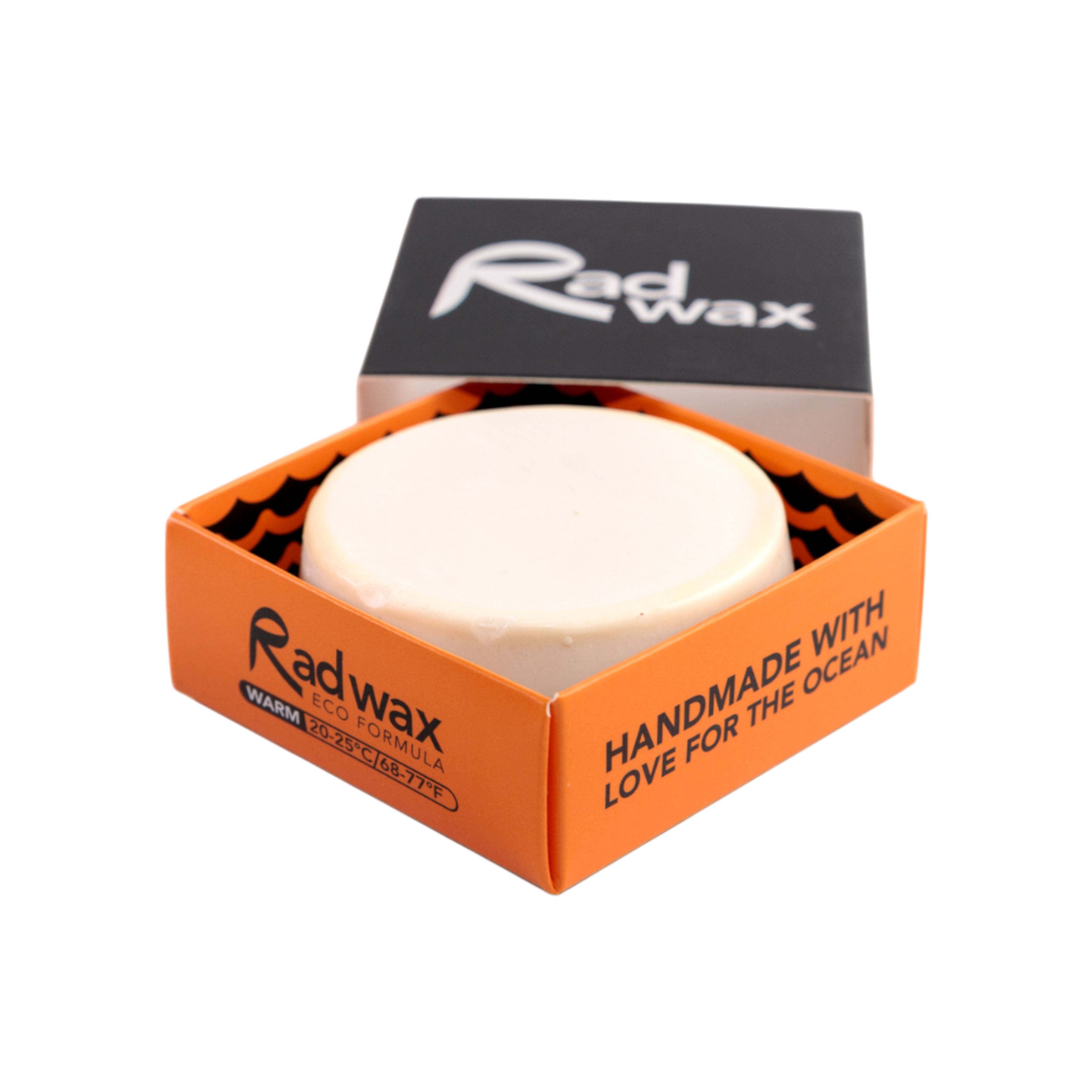 Rad Wax Warm Water Eco surf wax in an orange box on a white background