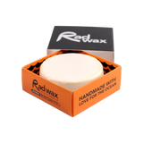 Rad Wax Warm Water Eco surf wax in an orange box on a white background