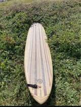 Longboard surfboard on grass with Rad Wax