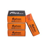 Orange and black Rad Wax packaging on a white background